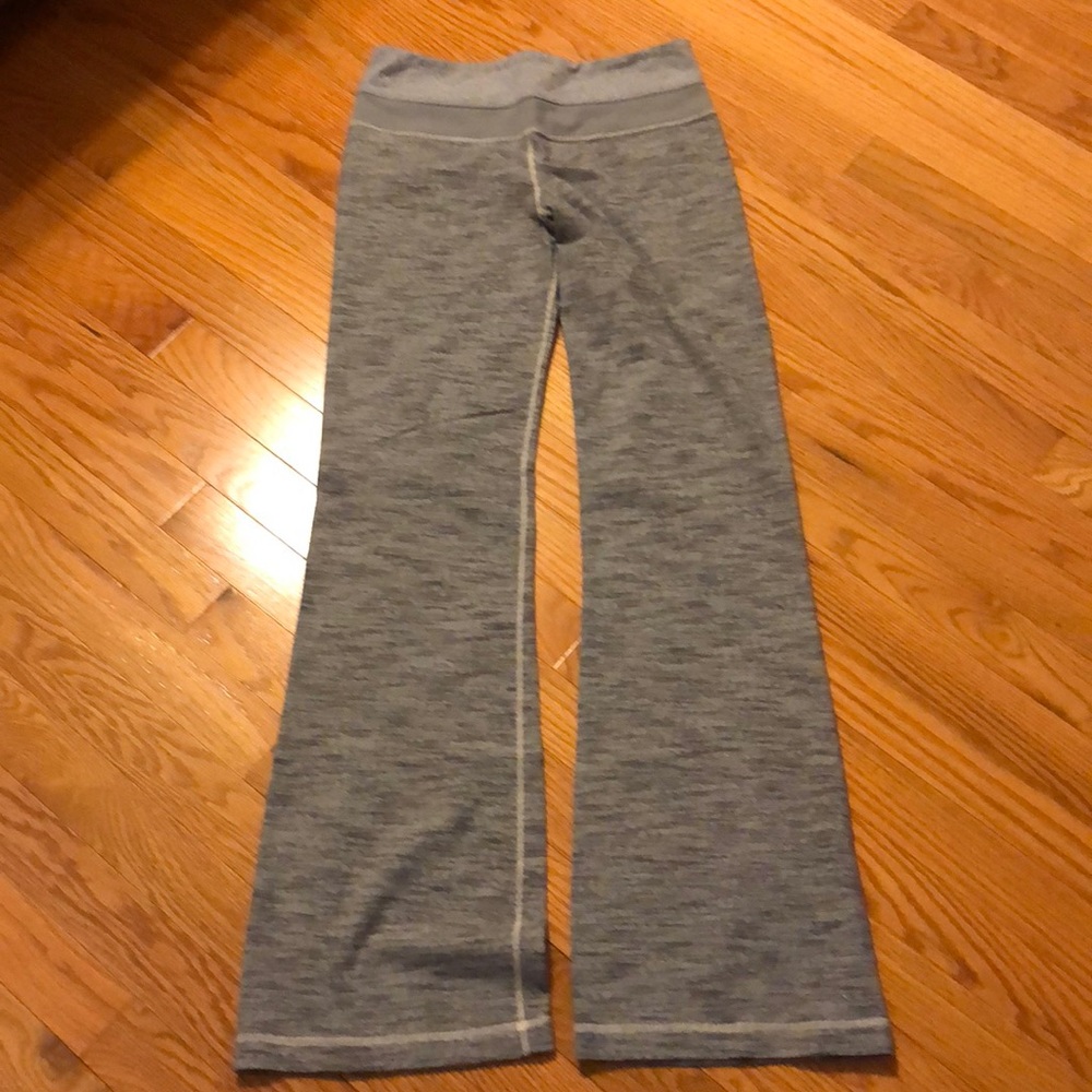 Lululemon leggings with a bell bottom leg.